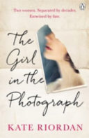 The Girl in the Photograph Book